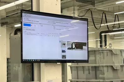 Babtec software in use at Polycontact AG Monitor in production hall of Polycontact AG