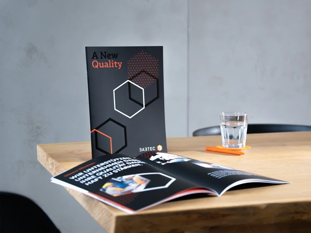 Brochure cover Brochure cover on a table