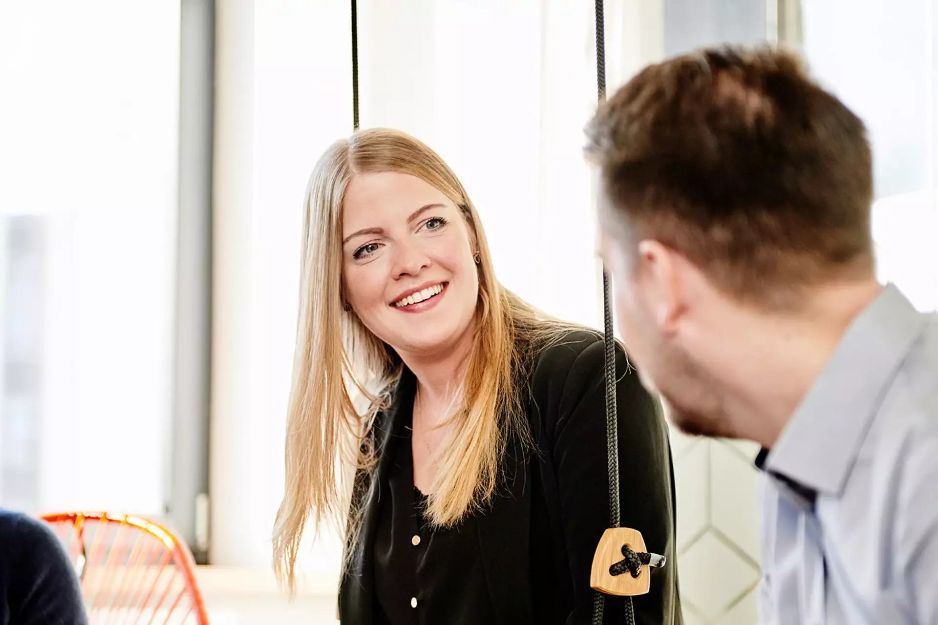 Babtec employees sit in the meeting room and talk