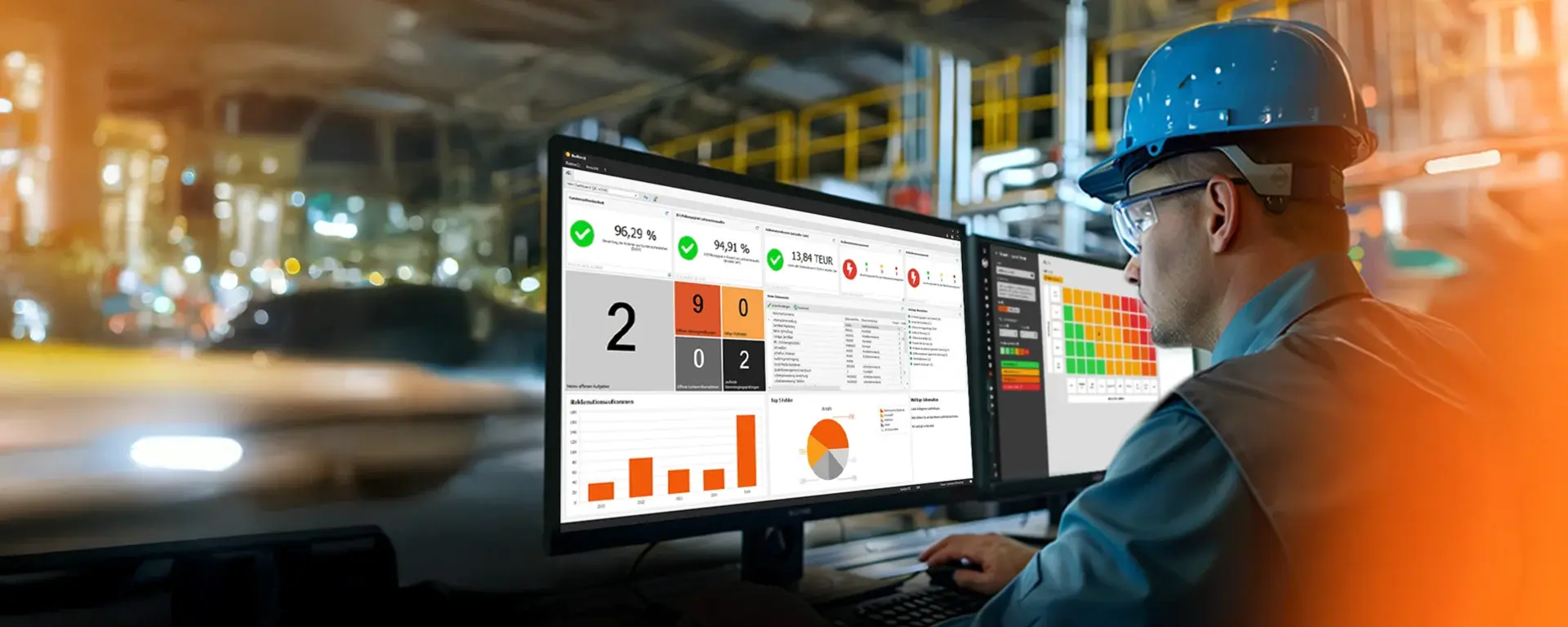 In a production facility, a man looks at two screens displaying Babtec's QM software
