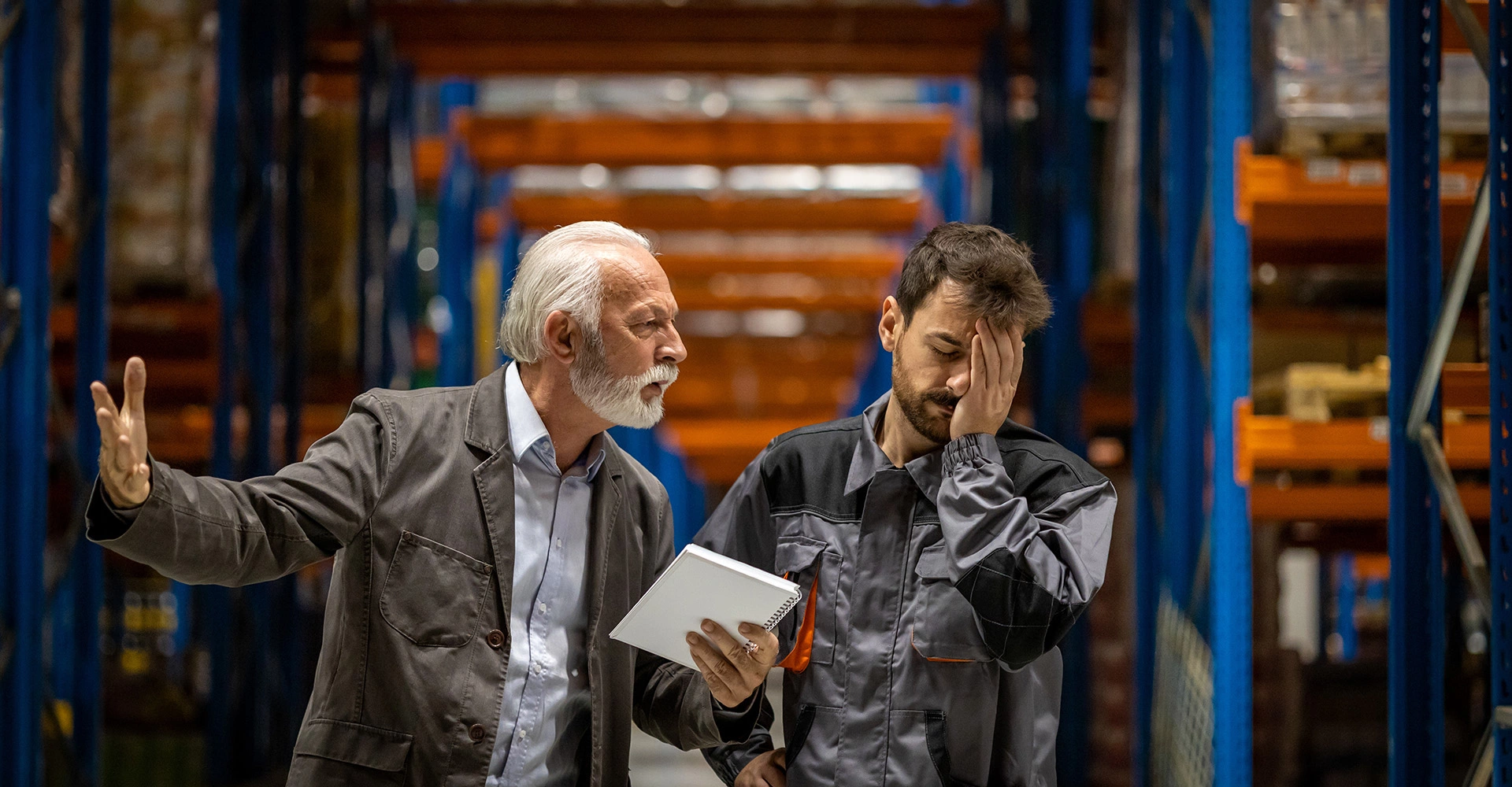 Two men discussing a complaint