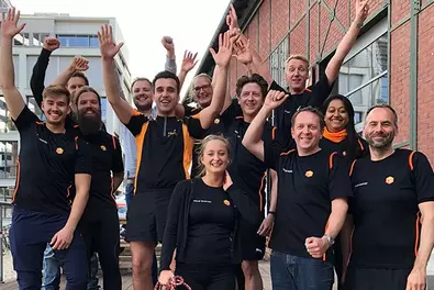 Düsseldorf at the helm’ charity regatta Group photo of Babtec employees in Babtec T-shirts at the ‘Düsseldorf am Ruder’ charity regatta