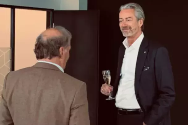 Opening of the Munich office Michael Flunkert in conversation with a guest